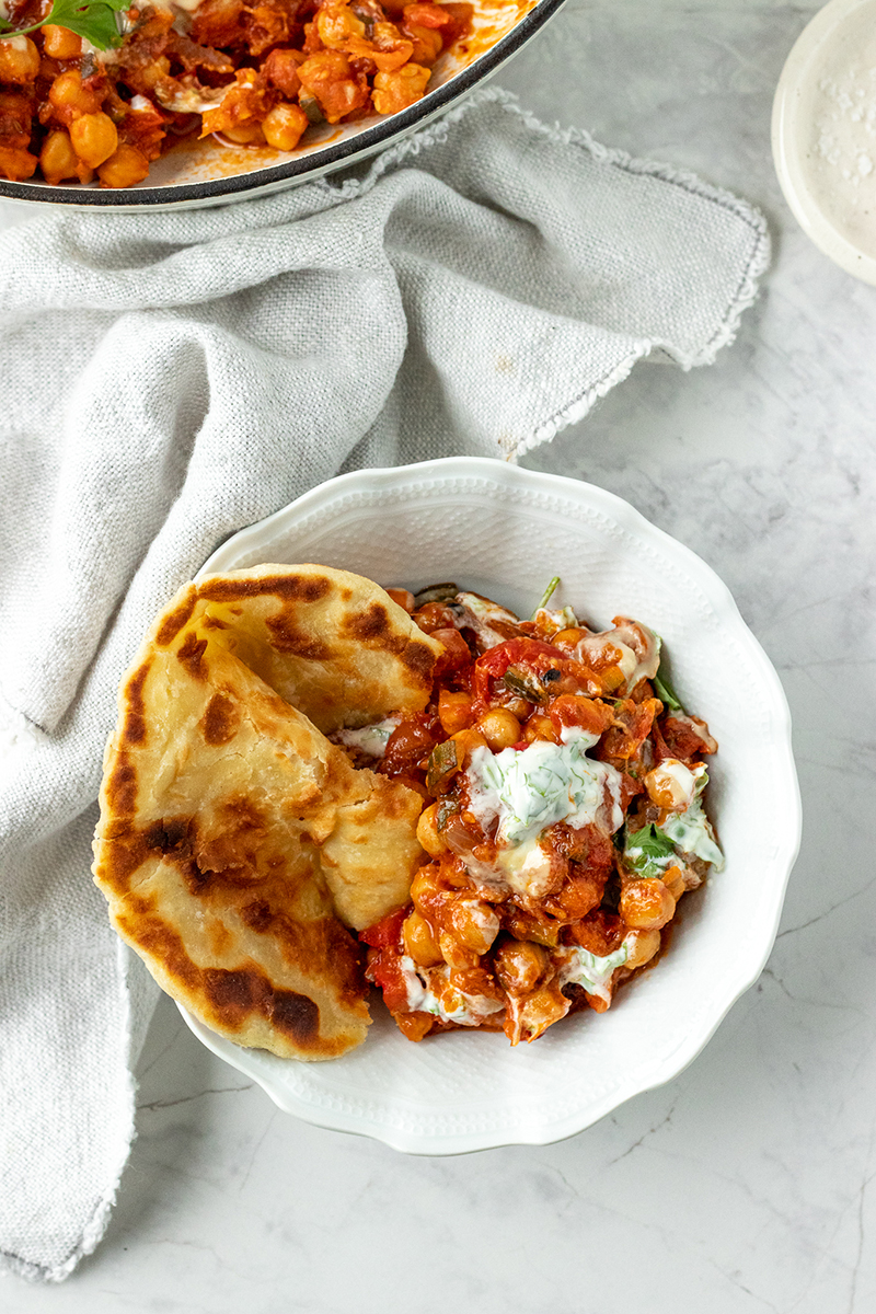 Cherry Tomato and Chickpea Hotpot with Coriander Yoghurt and Flatbreads